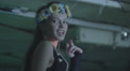 Beautiful Go Go dancer smiles at camera and keeps dancing Video