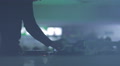 Male dj tweaking controls on sound board, nightclub atmosphere Video