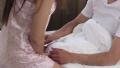Sexy female in nightdress comes and kisses partner in bed Video