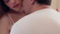 Hot couple passionately kissing and undressing in bedroom Video