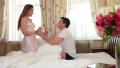 Boyfriend girlfriend hugging and passionately kissing in bed Video