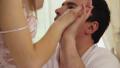 Seductive female in lingerie kisses and undresses boyfriend Video