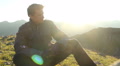 Happy male tourist smiling enjoying beautiful view on mountains Video