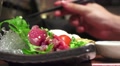 Mans Hand With Chopsticks Before He Picks Up A Peice Of Meat HD Video