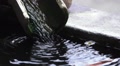 Bamboo Drainage Gutter Empties Into Pool Of Water 02 HD Video