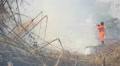 Firefighters try to control a fire Video