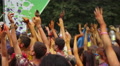 Crowd waving hands in the air, festival atmosphere, dancing Video