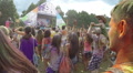 Slow motion, crowd putting hands up in air, festival atmosphere, click for HD Video