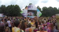 Happy audience throwing hands up in air at festival, slow-motion, click for HD Video