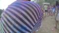 Young people covered in paint having fun at festival, slow-mo, click for HD Video