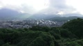 Steam Rises Over City Of Beppu Japan Looks Like Smoke And Fire Wide Shot HD Video