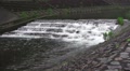 Water Flows Over Step Like Barrier In Tokyo - Hirai-gawa River 4K Video