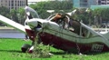 Crash Wreckage Of A Small Plane On Grass Field Close Up HD Video