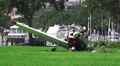 Crash Wreckage Of A Small Plane On Grass Field Next To Marina 02 HD Video