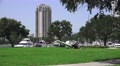 Crash Wreckage Of A Small Plane On Grass Field Next To Marina And Skyline 4K. Video