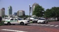 Police Cars And Officer On Brick Road Tampa Bay Marina And City Skyline HD Video
