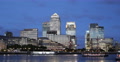 Ultra HD 4K Cruise Tour Boat Passing Canary Wharf London Office Buildings Night Video