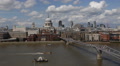 People Commute Pedestrians Millennium Bridge London Aerial View Skyline Crowd Video