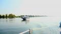 Luxury speed boat on wide river, summer, vacation, yachting POV Video