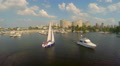 Aerial shot, sailing yacht on city river, small harbor, yachting Video