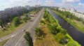 City road with cars, beautiful river, aerial view from drone Video