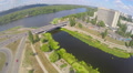 Aerial shot of bridge over river, road junction car traffic Video