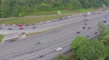 Cars driving slowly down the city road, traffic jam aerial Video