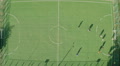 Soccer (football) players on field, active rest. View from air Video