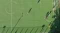 Amateur football, aerial shot of players running on the field Video