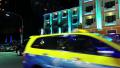 Road traffic near hotel with night illumination in Pattaya, Thailand Video