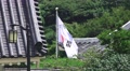 South Korean Flag Next To Rooftop And Trees At The Chungnyeolsa Shrine South Video