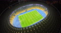 Panorama of beautiful stadium at night, footballers play match Video