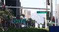 Establishing Shot Red Traffic Light Sign People Walk MGM Hotel Board Las Vegas Video