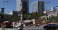 Establishing Shot Downtown Los Angeles LA Public Transportation Bus Passing Cars Video