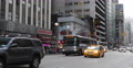 New York City Commuters Commuting Bus Passing Taxi Yellow Cab Rush Hour Busy NYC Video