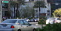 People Walking Pedestrians Crossing Las Vegas Boulevard Cars Passing Street Sign Video