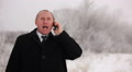 Bright joyful emotion after good news by mobile phone. Winter Video