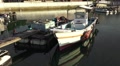 Tiny Small Fishing Boat A Dock In Harbor Good Reflections HD Video