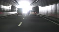 Driving To Exit Of Japanese Highway Tunnel Bright Sun Light At The End HD Video