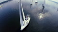 Aerial of sailing yachts on calm water, preparing for regatta Video