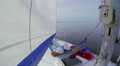 Relaxed man lying in hammock on sailboat, sea, vacation, tourism Video