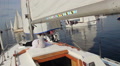 Man lying on deck sailing yacht, having rest before race Video