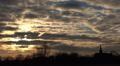 Cloudy sunset with convent church timelapse Video