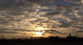 Cloudy sunset with convent church timelapse Video