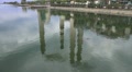 Power Plant By Water With Smoke Stacks Tilt Up HD Video