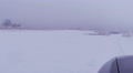 Car goes across field in winter. POV FPV view Video
