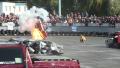 Stunt car flips over, explodes. Thrilled audience. Part2of2 Video