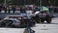 Bigfoot roaring, drifting, entertaining audience. With sound Video