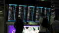 People near information board in Bangkok international airport, Thailand Video