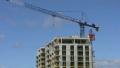 Construction crane. Time lapse. Footage
